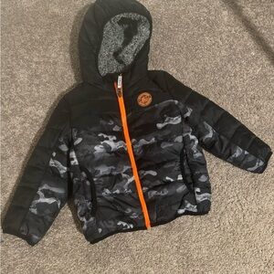 Multicolored dinosaur winter coat.